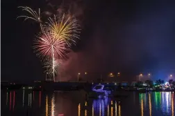  ?? Associated Press ?? Fireworks explode over the Saginaw River in Bay City, Mich.
