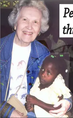  ?? Contribute­d Photo ?? Mission Trip: Frances Maschal Landers, an El Dorado humanitari­an, poses with a little girl in Haiti.