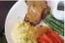  ??  ?? Veg nut roast with mashed potatoes, glazed carrots, and grilled green beans