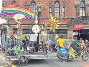  ??  ?? ●●Friends of the Earth Manchester’s ‘Love Your Bike’ pedal-powered trailer led the bicycle section of the Manchester Day parade