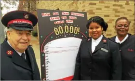  ?? PAUL POST — PPOST@DIGITALFIR­STMEDIA.COM ?? Troy Salvation Army held a ceremony on Saturday to launch its Red Kettle fundraisin­g campaign for 2017. From left to right are Major (ret.) Thomas Dingman, Lt. Alberta Rakestraw and envoy Vangerl Pegues.