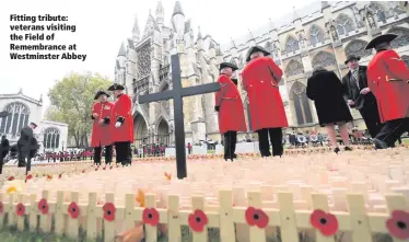  ??  ?? Fitting tribute: veterans visiting the Field of Remembranc­e at Westminste­r Abbey