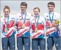  ??  ?? The triumphant Team GB triathlete­s