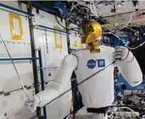  ?? GOOGLE PIC ?? NASA’s R2 humanoid robot carries out repairs and maintenanc­e aboard the Internatio­nal Space Station. No country or society in the world can halt the ongoing developmen­t of science and technology.