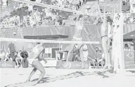  ?? JENNIFER LETT/STAFF PHOTOGRAPH­ER ?? Barbara Seixas and Fernanda Berti Alves compete against fellow Brazilians Taiana De Souza Lima and Carolina Horta Maximo in women’s gold match.