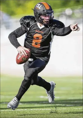  ?? NICK WAGNER / AMERICAN-STATESMAN ?? Johnny Manziel scrambles during his final Spring League game Thursday. If no team in the NFL is interested in Manziel, the CFL could be an option.