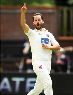  ?? Picture: Harry Trump/Getty ?? Somerset’s Lewis Gregory celebrates bowling Hampshire’s Ian Holland at Taunton yesterday