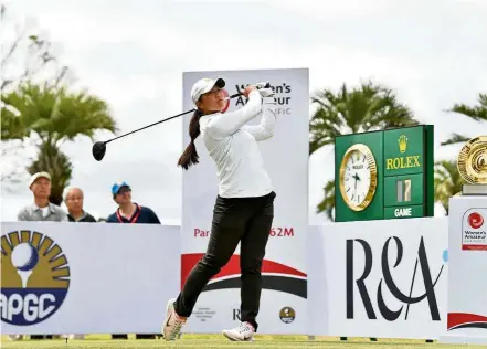  ??  ?? Slow and steady: Ashley Lau showing great composure to weather the tough, windy conditions to make the weekend cut for the Women’s Amateur Asia Pacific championsh­ip in Hokota, Japan.