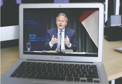  ?? DAVID KAWAI/BLOOMBERG ?? The pandemic is giving rise to new opportunit­ies for businesses in the new COVID-19 era, says Kevin Carmichael. “It’s going to be long enough for certain habits to change,” says Bank of Canada governor Stephen Poloz, seen during a virtual news conference in Ottawa last week.