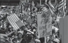  ?? MAGNUM PHOTOS ?? "Hard-Hats" demonstrat­e in favor of the Vietnam War in New York in 1970. It’s one scene in Ken Burns’ new documentar­y, "The Vietnam War," premiering on Sept. 17 on PBS.