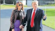  ?? REUTERS ?? US President Donald Trump talks to reporters with first lady Melania Trump as they depart for travel to the G20 summit.
