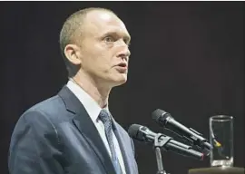  ?? Pavel Golovkin Associated Press ?? CARTER PAGE, shown speaking in Moscow in 2016, was a foreign policy advisor for candidate Donald Trump. He was suspected of being a Russian agent.