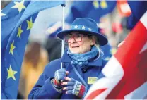  ?? PHOTO: REUTERS ?? True Brit . . . An antiBrexit demonstrat­or protests outside the Houses of Parliament in London yesterday.