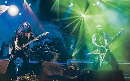  ?? Steve Thorne Redferns ?? TOM ARAYA, left, and Kerry King of Slayer perform in Birmingham, England, in 2018, as part of 40-country Final Campaign tour. It all ends in L.A. this weekend.