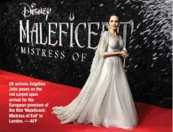  ?? — AFP ?? US actress Angelina Jolie poses on the red carpet upon arrival for the European premiere of the film ‘Maleficent: Mistress of Evil’ in London.