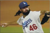  ?? TONY GUTIERREZ — THE ASSOCIATED PRESS ?? Rookie Tony Gonsolin, who spent most of his three seasons at Saint Mary’s College as an outfielder, is the Dodgers’ starting pitcher for tonight’s Game 6 of the World Series.