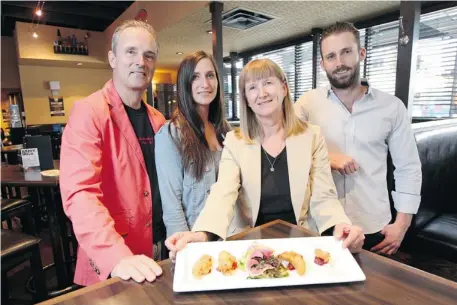  ?? Photos: Colleen De Neve/calgary Herald ?? Members of the Allan family — Stuart, left, Jennifer, Colleen and Geoff — own and run Buzzards/Bottlescre­w Bill’s pub. This will be the 20th year Buzzards hosts its Testicle Festival, which features Battered Balls, among other menu items.