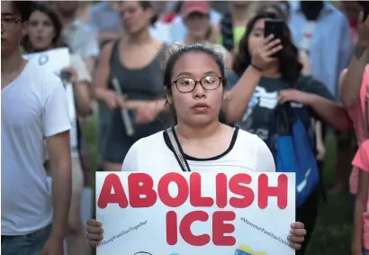  ?? AFP ?? Demonstrat­ors march in the Little Village neighbourh­ood calling for the eliminatio­n of the US Immigratio­n and Customs Enforcemen­t (ICE) and an end to family detentions in Chicago on Friday. —