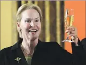  ?? Myung J. Chun Los Angeles Times ?? FRANCES ARNOLD, a Caltech biochemica­l engineer, celebrates her Nobel Prize in chemistry, which she won along with a fellow American and a Briton.