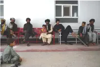  ??  ?? HELMAND PROVINCE: In this photograph taken on October 6, 2016, Afghan patients wait for a medical consultati­on in a waiting room at Emergency hospital in Lashkar Gah. —AFP