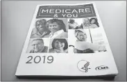  ?? PABLO MARTINEZ MONSIVAIS/AP PHOTO ?? In this Nov. 8, 2018, file photo, the U.S. Medicare Handbook is shown in Washington.