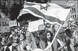  ?? Dania Maxwell Los Angeles Times ?? ACTIVISTS show their support for Israel or for the Palestinia­ns in a polarized demonstrat­ion at UCLA in April. The 2024 U.S. election also proved to be divisive.