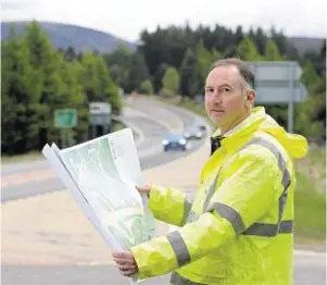  ??  ?? MAPPED OUT: A9 Tomatin to Moy project manager Steve Bye with route plans