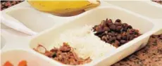  ??  ?? ► Pabellón criollo, el plato top venezolano que representa a las distintas razas de sus ancestros.