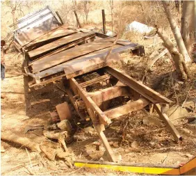  ??  ?? The wreckage of the truck in which 12 members of an apostolic sect died