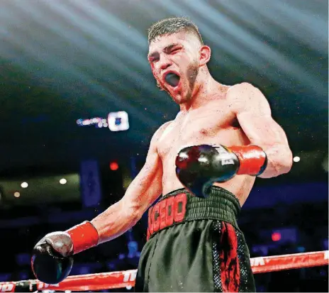  ?? [PHOTOS BY NATE BILLINGS, THE OKLAHOMAN] ?? Alex Saucedo celebrates after winning his fight against Lenny Zappavigna on June 30 at Chesapeake Energy Arena.