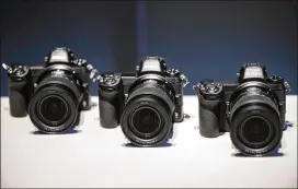  ?? KEITH BEDFORD / BLOOMBERG ?? Nikon’s Z6 mirrorless digital cameras mounted with Nikkor Z 24-70mm f/4S zoom lenses are displayed at a news conference Thursday.