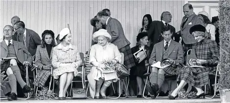  ??  ?? From left, the Duke of Edinburgh, Queen Elizabeth, the Queen Mother, Prince Charles and Princess Diana at the Braemar Highland Games in 1981.