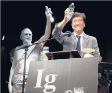  ?? ELISE AMENDOLA/AP ?? Shigeru Watanabe of Japan receives the Ig Nobel award in chemistry in 2019 for estimating the total saliva volume produced per day by a typical 5-year-old.