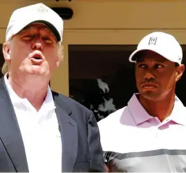  ?? REX ?? All eyes on Tiger: Woods joins Trump at an event in 2014