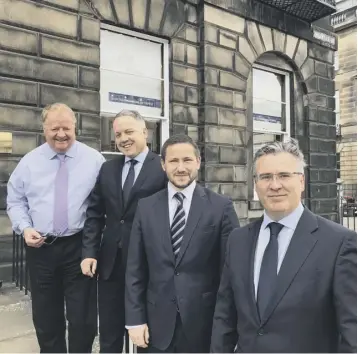  ??  ?? From left: SFE chief Graeme Jones with CBS’ Iain Beggs, Stephen Verrecchia and Eddie Curran