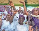  ?? SUNDAY ALAMBA/AP ?? Women gather Wednesday during a celebratio­n at the Mobolaji Johnson Stadium in Lagos, Nigeria.