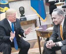  ?? Jabin Botsford Washington Post ?? PRESIDENT TRUMP talks immigratio­n with Sen. Charles E. Schumer on Tuesday. A rule change would discourage immigrants from seeking safety net benefits.