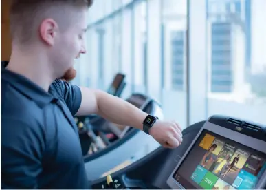  ?? Supplied photo ?? as you work out, an apple Watch measures your vitals, which are then reflected on a gym equipment’s monitor. —