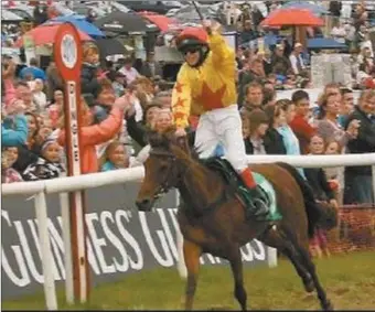  ??  ?? Eleven year old Jack Kennedy winning at the Dingle Races on Three Jacks.