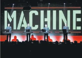  ??  ?? Members of German band Kraftwerk perform on the Miles Davis Hall stage during the 39th Montreux Jazz Festival in 2005 in Switzerlan­d, with Florian Schneider at right.