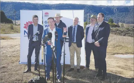  ?? PHOTO: SUPPLIED ?? NSW regional roads minister Paul Toole announces planned upgrades to the Great Western Highway with Calare MP Andrew Gee and deputy prime minister Michael Mccormack looking on.