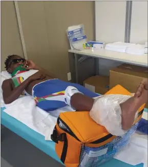  ?? Photos: Nampa/Contribute­d ?? On the mend… Ishitile is seen here with an iced ankle after injuring herself during a training session in Tokyo.