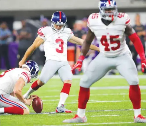  ?? AFP ?? MINNEAPOLI­S: This file photo taken on October 2, 2016 shows Josh Brown #3 of the New York Giants as he converts a field goal at the end of the first half of the game against the Minnesota Vikings at US Bank Stadium. —