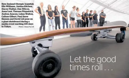  ?? Photo / Dean Purcell ?? New Zealand Olympic hopefuls Ella Williams, Justina Kitchen, Stacey Flulher, Dan Wilcox, Anna Leat, Theresa Fitzpatric­k, Andrea Anacan, Lukas Walton, Callum Gilbert, Paul Snow Hansen and David Liti pose on a giant skateboard during a media event marking 100 days to Tokyo.