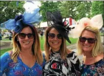  ?? PHOTOS BY PAUL POST — PPOST@DIGITALFIR­STMEDIA.COM ?? Lindsay Parmerter, Diana Asner and Celina Bilinski, of Clifton Park, from left to right, got stuck on the way to the track Saturday when their Uber vehicle got a flat tire.