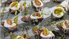  ?? PHOTO BY TOM MCCORKLE FOR THE WASHINGTON POST. ?? Figs with goat cheese, pistachios and mint.