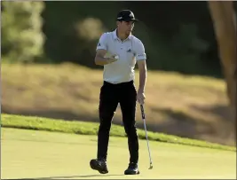  ?? RYAN KANG — THE ASSOCIATED PRESS ?? Joaquin Niemann reacts after making a birdie putt on the seventh hole during the first round of the Genesis Invitation­al on Thursday at Riviera Country Club.