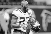  ?? CARMEN MANDATO/GETTY ?? Bruising Jacksonvil­le Jaguars running back Leonard Fournette is entering the final year of his rookie contract and facing an uncertain future with the franchise.