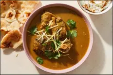  ?? ?? Spiced oxtail stew. Nihari, a gingery beef stew popular in northern India and Pakistan, is traditiona­lly sealed in the pot and cooked overnight.