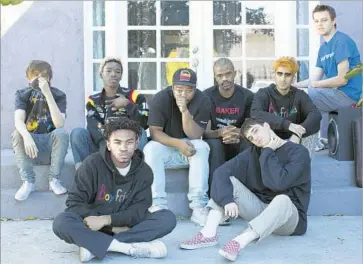  ?? Myung J. Chun Los Angeles Times ?? SOME members of Brockhampt­on at their NoHo base: in front, from left, Kevin Abstract and Matt Champion. In back, from left, Bearface, Merlyn Wood, Dom McLennon, Ameer Vann, Romil Hemnani and JOBA.
